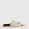Sandálias com palmilha com detalhes cortados a laser