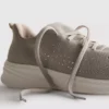 Sapatilhas slip-on com detalhes em diamantes