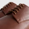 Sapatos oxford com atacadores