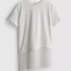 T-shirt assimétrica de algodão com franjas