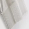 T-shirt assimétrica de algodão com franjas
