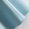 T-shirt de corte reto com detalhes nas costuras, rica em algodão