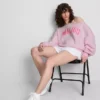 The Primark Scene | Camisola com ombros à vista e slogan