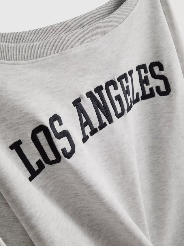 The Primark Scene | Camisola com ombros à vista e slogan