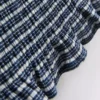Top bandeau com folhos em xadrez da Paula Echevarría