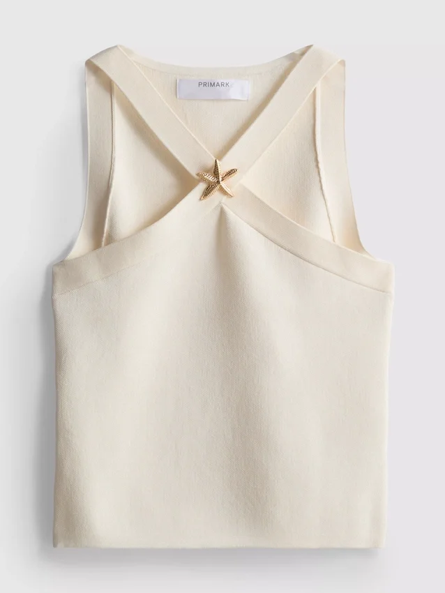 Top com decote halter e padrão de estrelas-do-mar