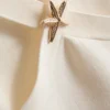 Top com decote halter e padrão de estrelas-do-mar