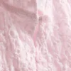 Top com gola alta texturada