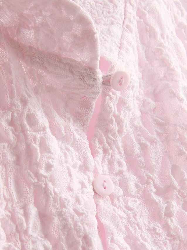 Top com gola alta texturada