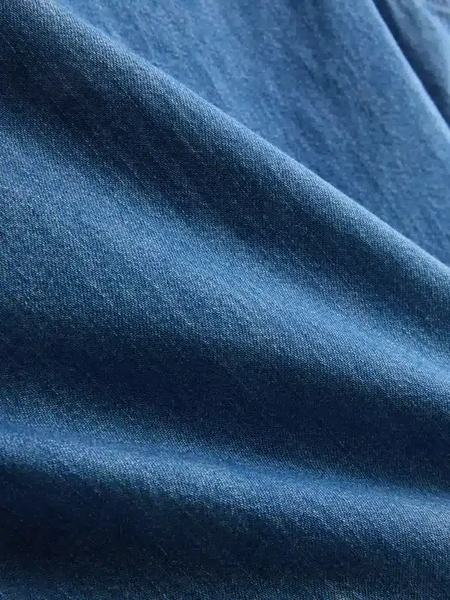 Top curto de algodão denim com folhos