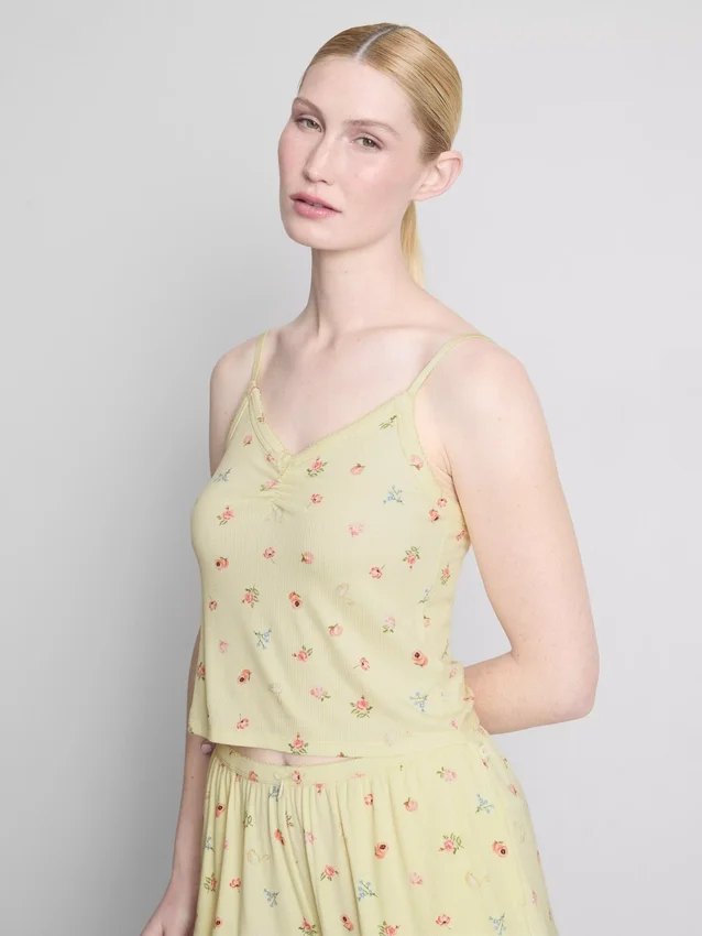 Top de pijama com alças finas e padrão floral em tecido canelado