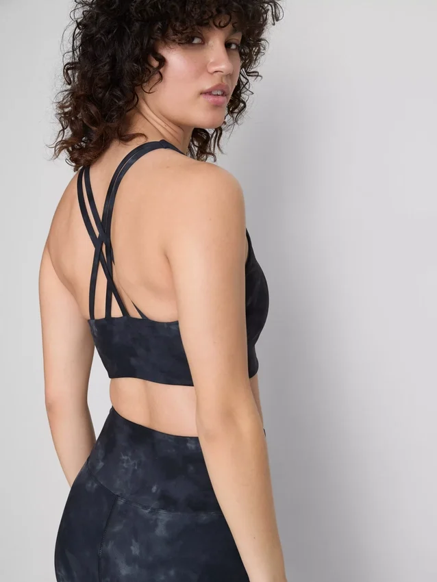 Top desportivo curto com costas em forma de «racerback» e estampado em mármore