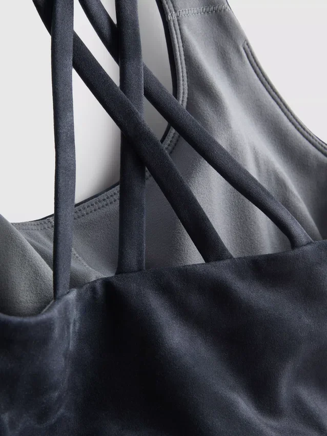 Top desportivo curto com costas em forma de «racerback» e estampado em mármore