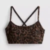 Top desportivo curto com costas em forma de U e padrão leopardo