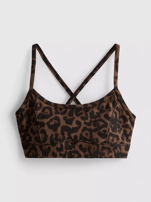 Top desportivo curto com costas em forma de U e padrão leopardo