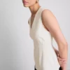 Top sem mangas com peplum e decote em V