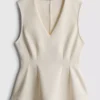 Top sem mangas com peplum e decote em V