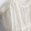 Top tipo camisola com bainha em forma de lenço de algodão