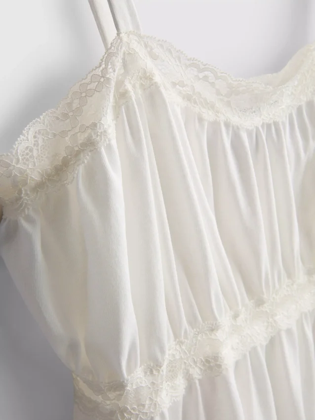 Top tipo camisola com bainha em forma de lenço de algodão