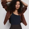 Top tipo camisola elástico com alta percentagem de algodão