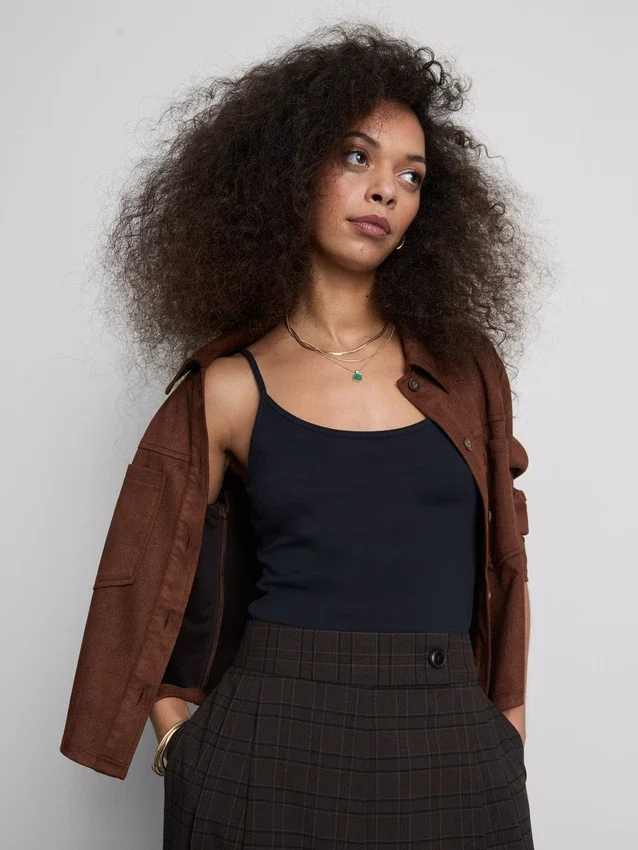 Top tipo camisola elástico com alta percentagem de algodão