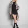 Vestido mini tipo t-shirt justo com canelado